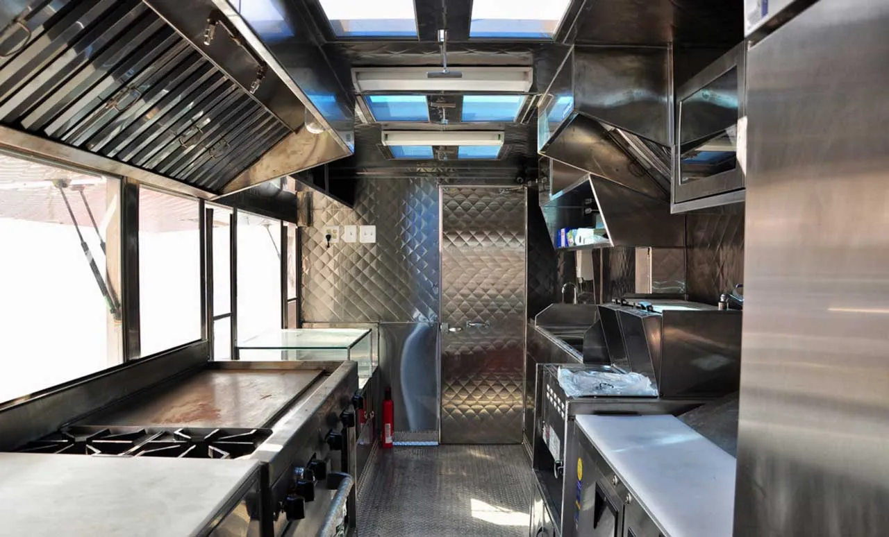 Satisfied restaurant owner with Portland Hood Cleaning Pros technician