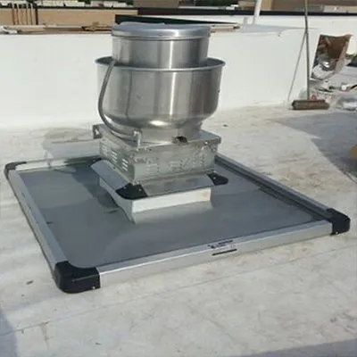 Rooftop grease containment system installation
